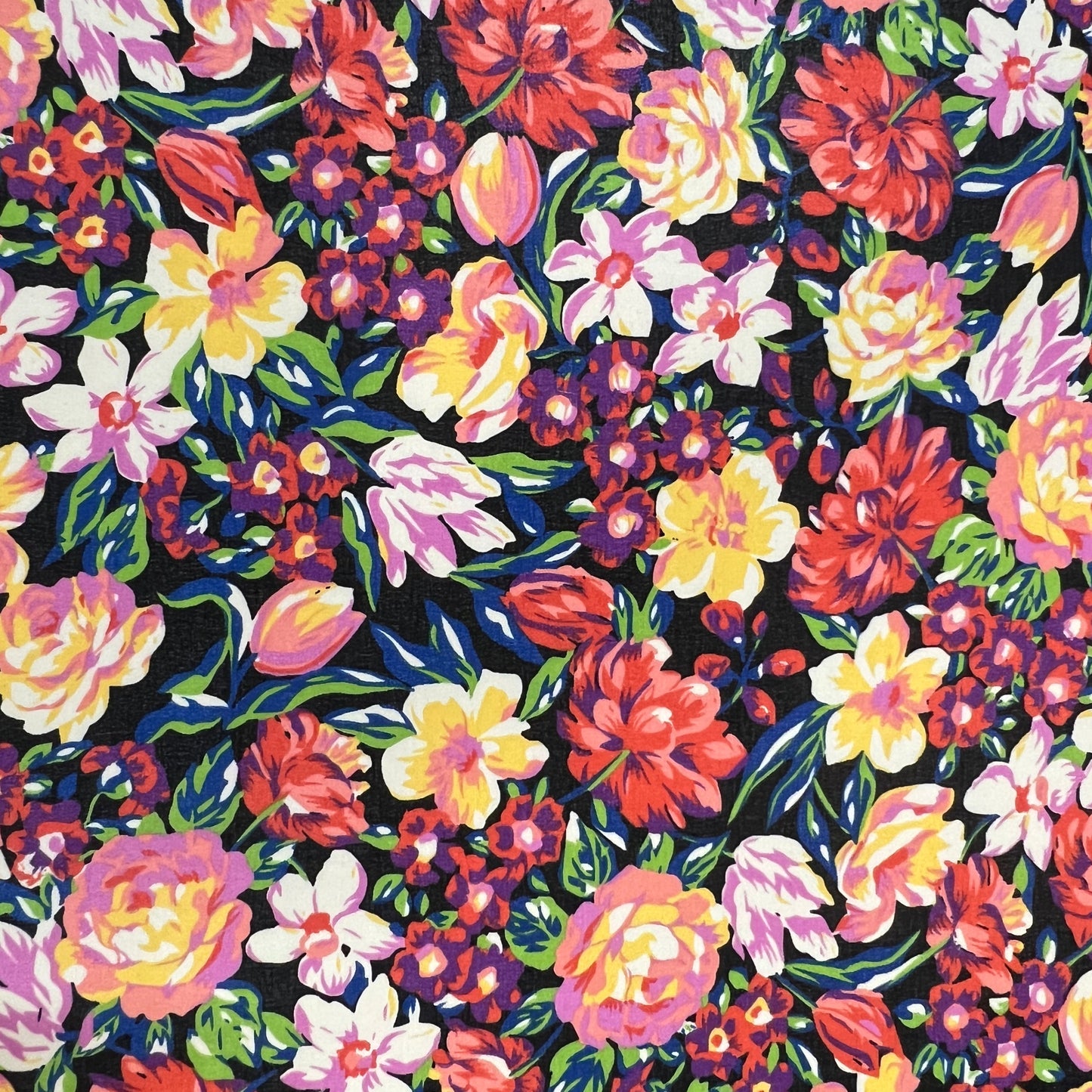 Erza : Crêpes viscose fond noir à fleurs multicolores