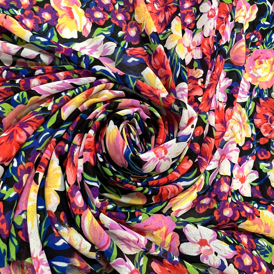 Erza : Crêpes viscose fond noir à fleurs multicolores
