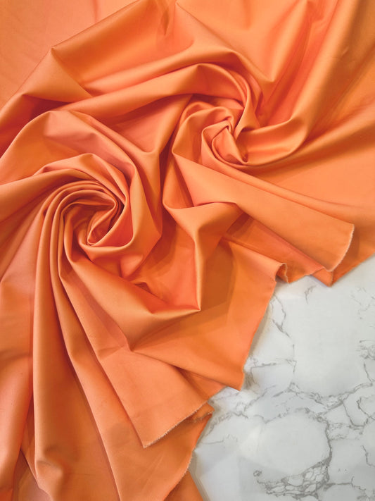 JOSE: Gabardine de coton satiné strech orange mangue
