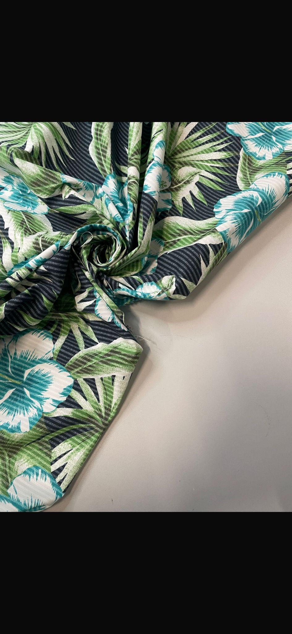 Mylla: Waterproof fabric with tropical and striped pattern