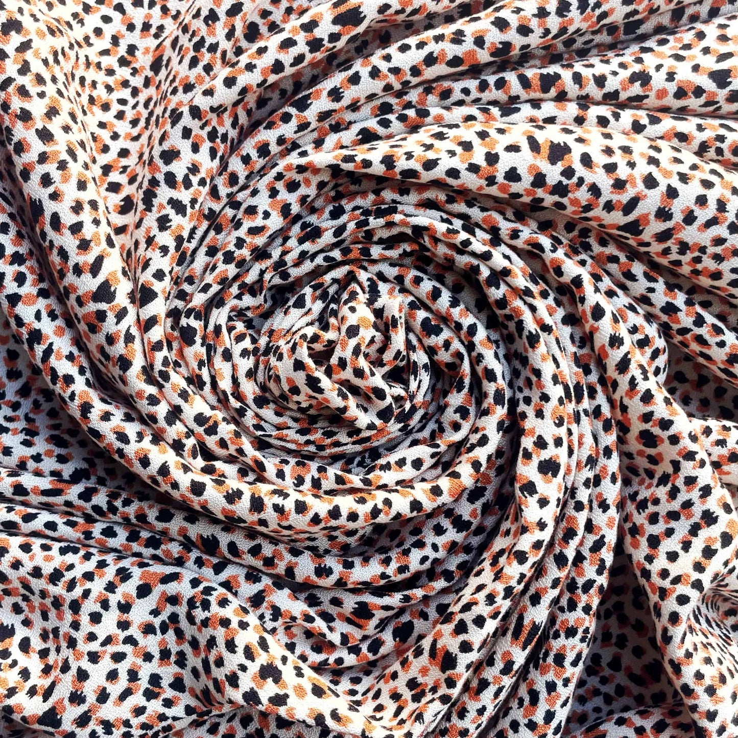 ÉLÉONORE: Crêpe Viscose Imprimé tacheté orange et noir