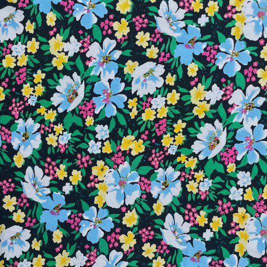 Tissu en crêpe imprimé floral Clémence de Tiss'ART, texture légère et élégante avec motif floral coloré.
