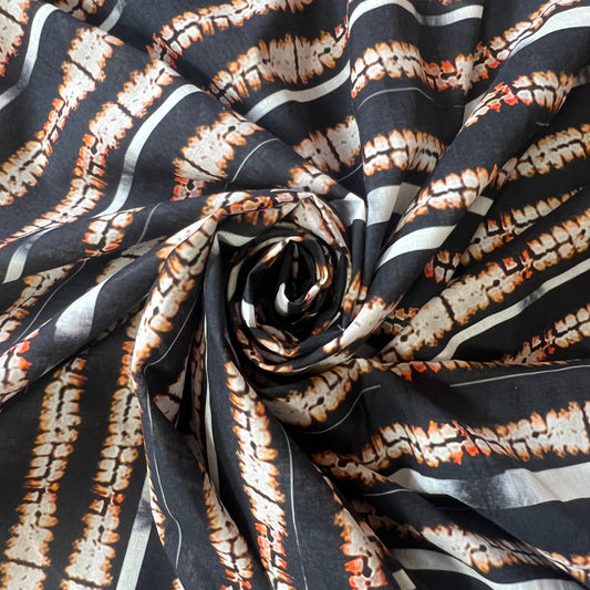 AGLAÉ: cotton poplin printed with Ikat stripes