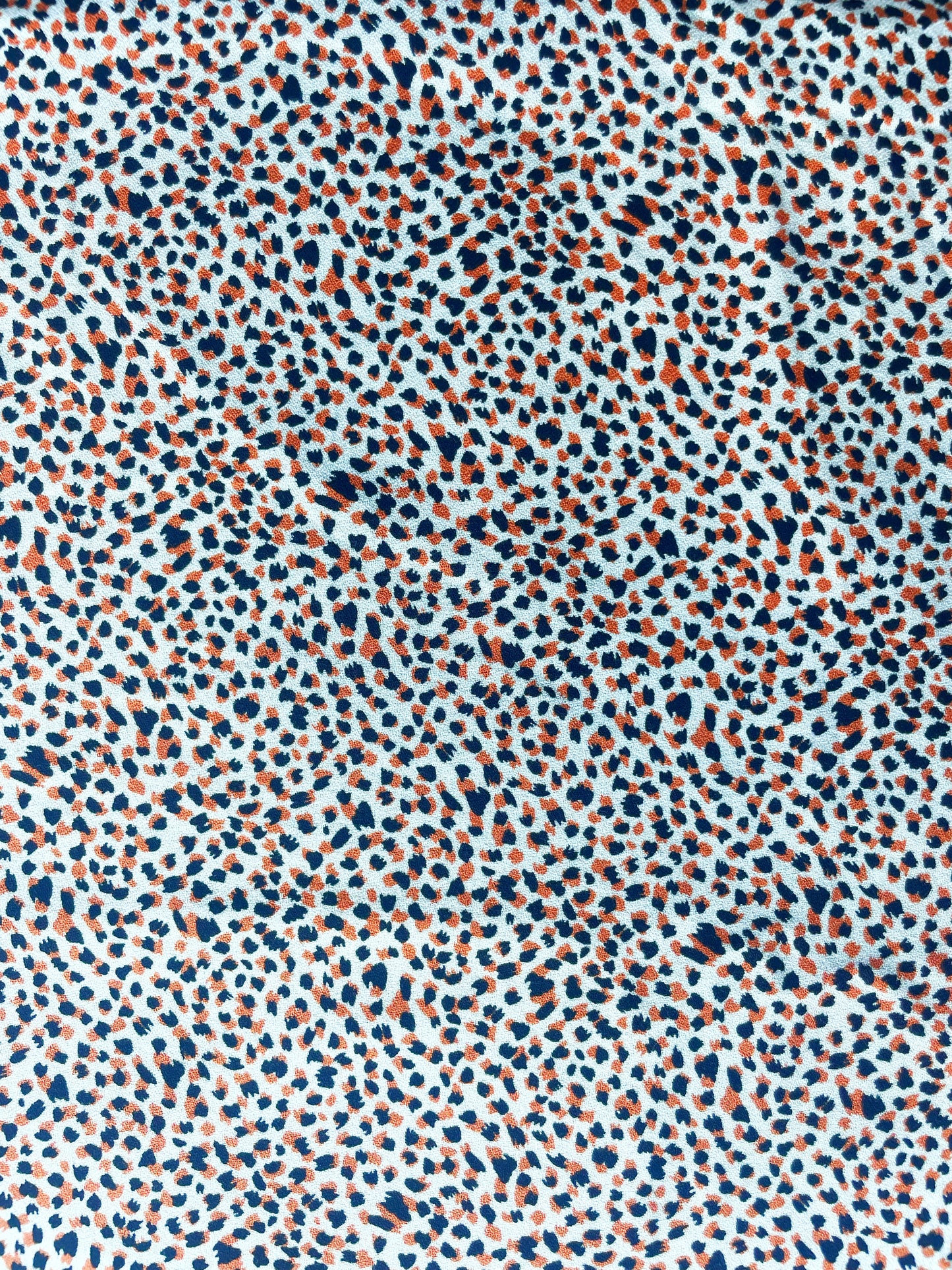 ÉLÉONORE: Crêpe Viscose Imprimé tacheté orange et noir